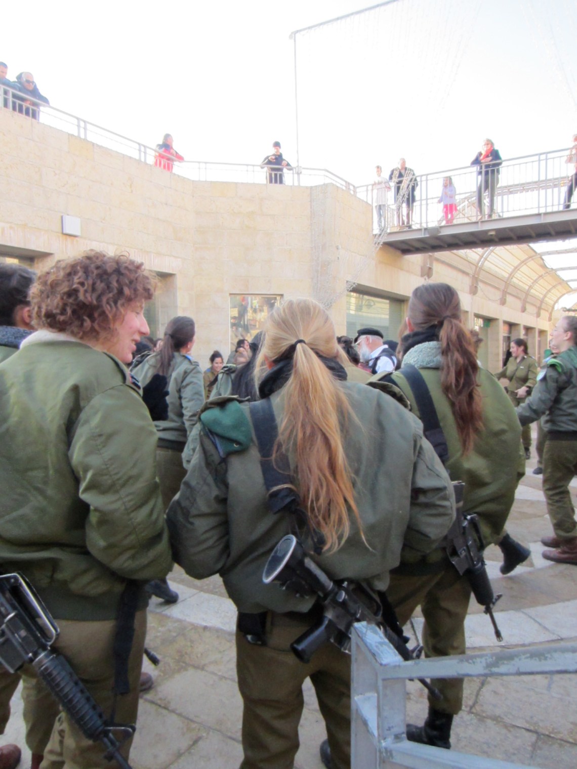 Female soldiers dancing on square at the outskirts of the Old City in Jerusalem, Israel